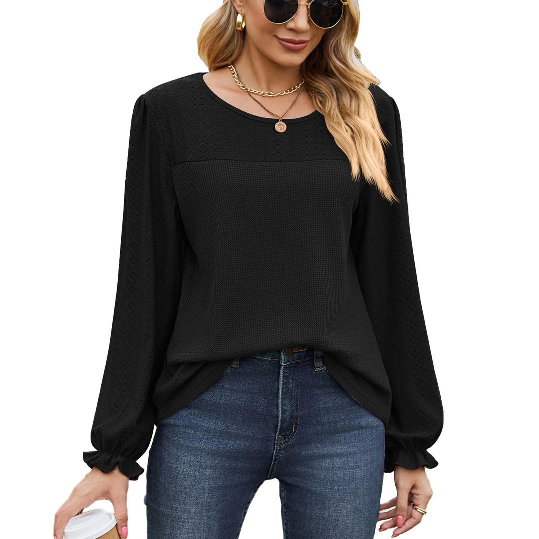 Women's top with textured design and elegant puff sleeves Lune London