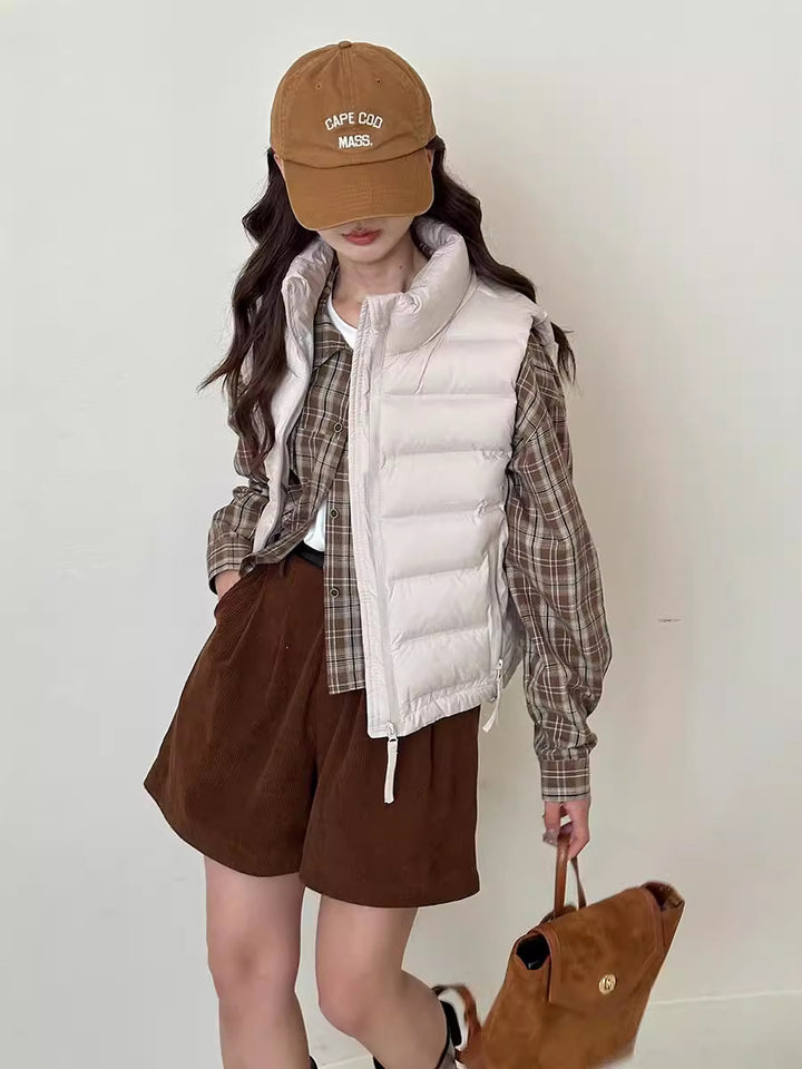 Ladies quilted gilet with adjustable drawstring waist and practical pockets Lune London