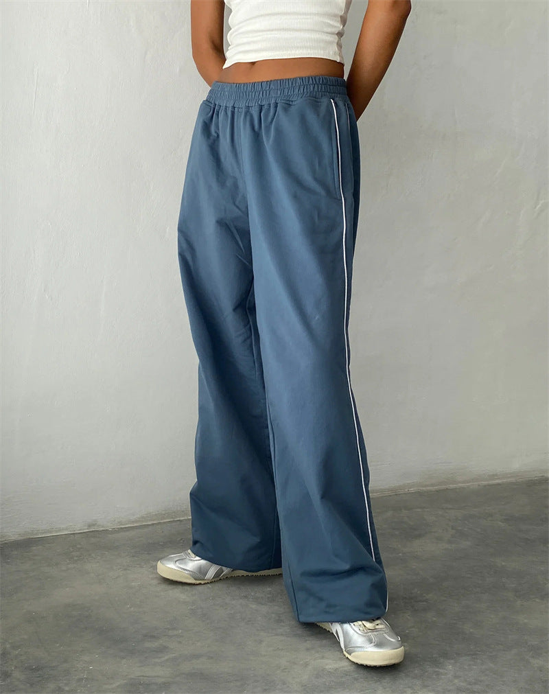 Wide leisure pants for women with side stripes and an elastic waist Lune London