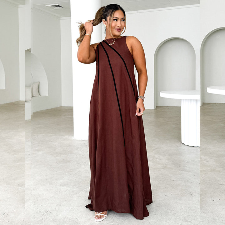 Women's maxi dress with asymmetric design and elegant contrast seams
