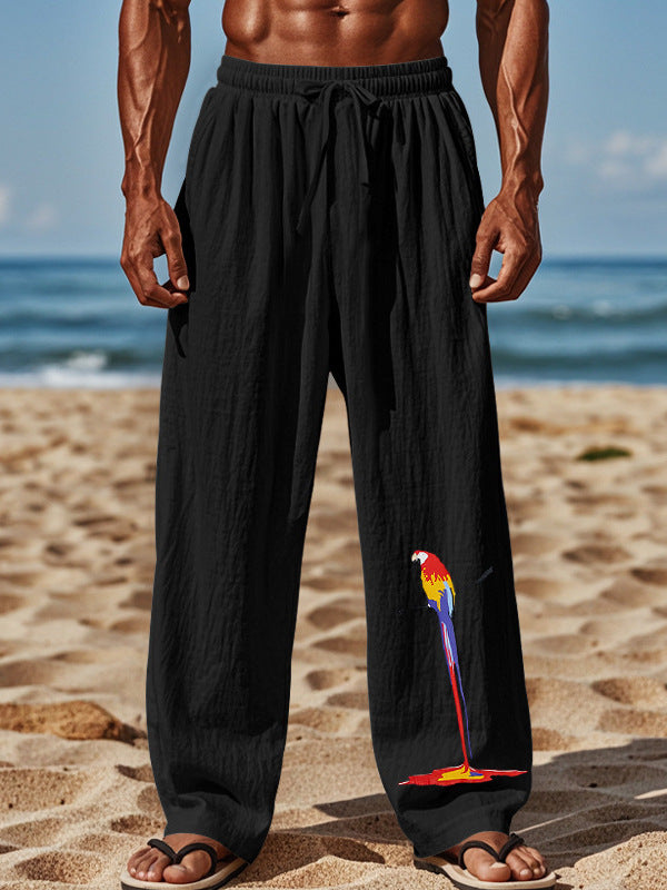 Light beach pants for men with colorful parrot design Lune London