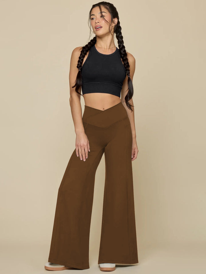 Elegant high-waisted casual trousers for women, with wide legs and practical pockets Lune London