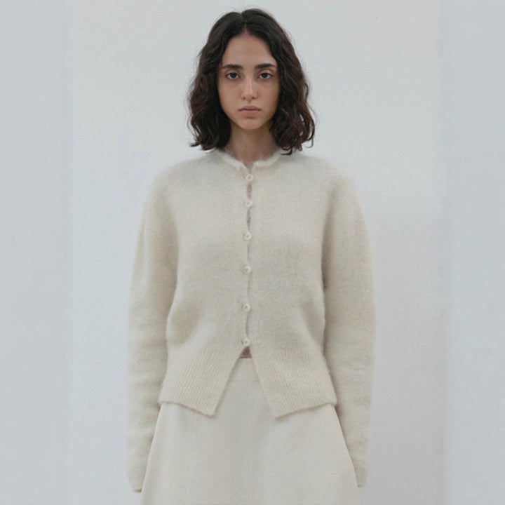 Veste en tricot élégante et chaude pour femmes avec patte de boutonnage Chic & Stil