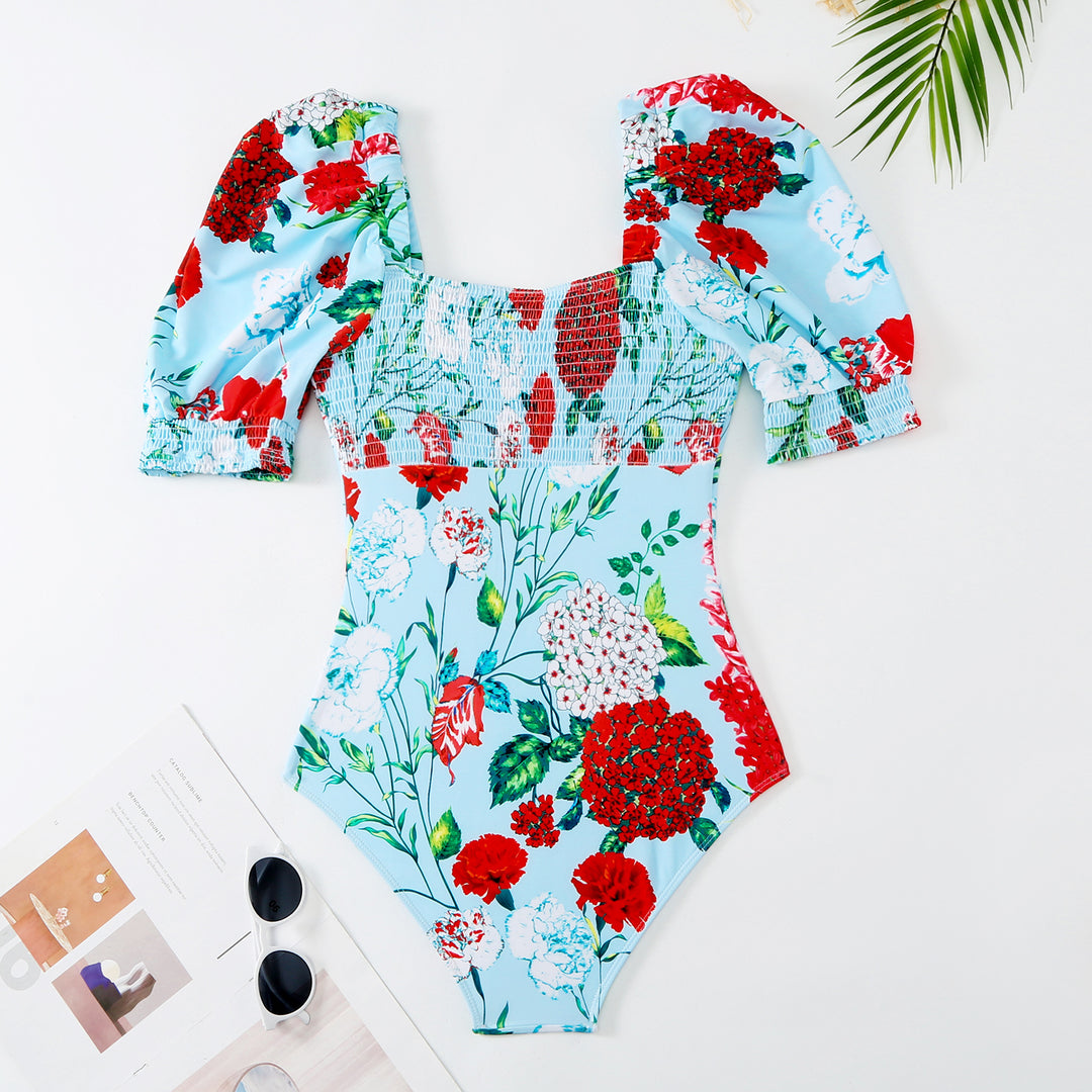 Ladies' swimsuit with voluminous puff sleeves and a matching wrap skirt Lune London