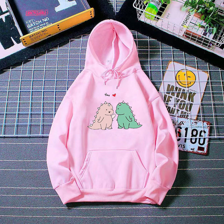 Women’s hoodie with playful dinosaur motif Chic & Stil