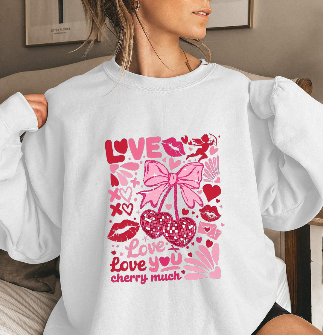 Sweat-shirt pour femmes avec des manches volumineuses et un motif cerise ludique Chic & Stil