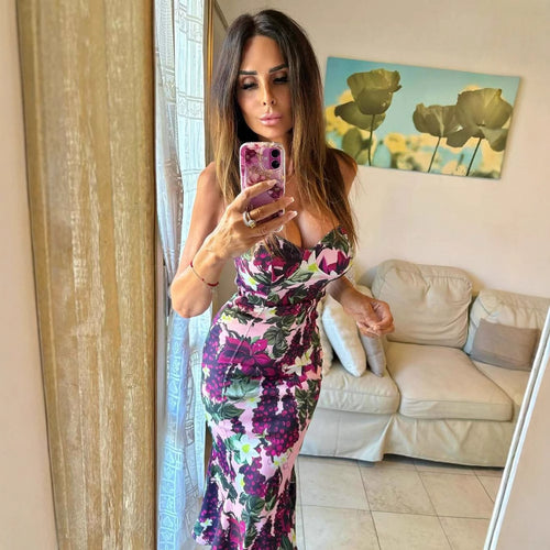 Maxi dress for women with a floral design featuring a fluid hem and a deep V neck Lune London