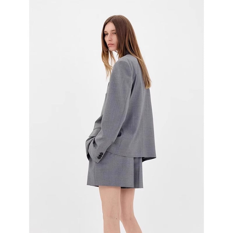 Blazer surdimensionné élégant pour femmes avec motif à carreaux subtil Chic & Stil