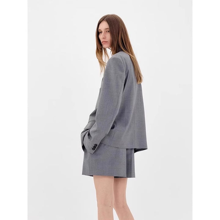 Blazer surdimensionné élégant pour femmes avec motif à carreaux subtil Chic & Stil