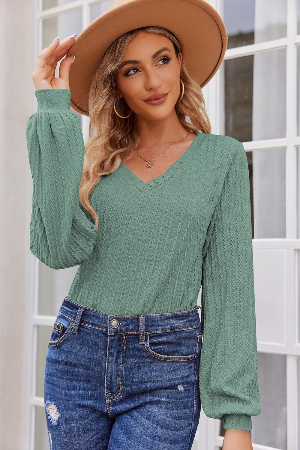 Women's knit sweater with a fine ribbed texture and a casual V-neck Lune London