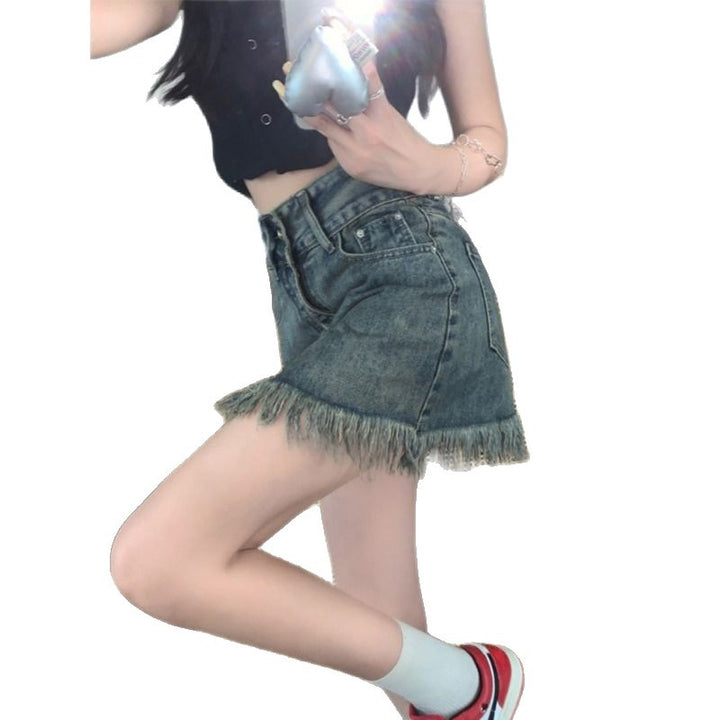 Women’s denim shorts with frayed hem and high waist
