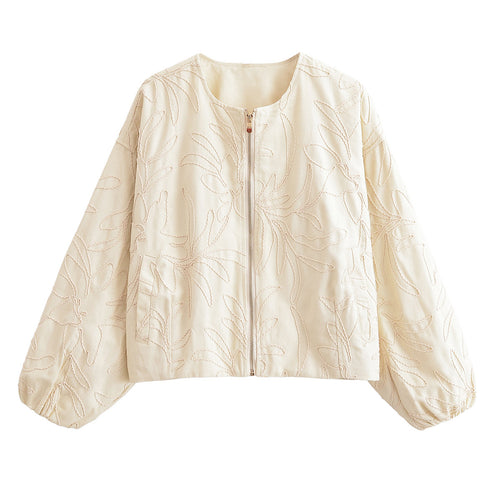 Haut matelassé pour femmes avec broderie florale Chic & Stil