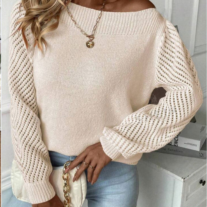 Pull en tricot pour femmes avec des manches trouées à la mode et un col rond Chic & Stil