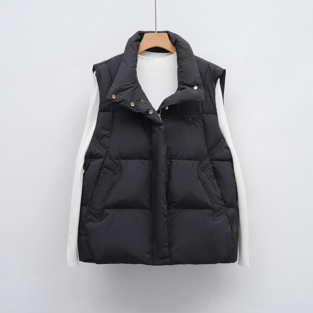 Quilted vest for ladies with high collar and practical pockets Lune London