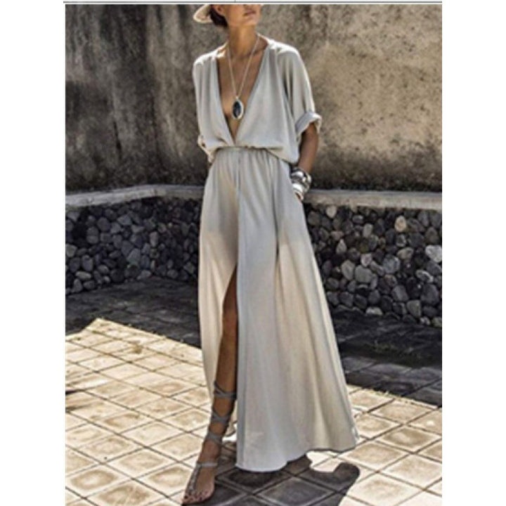 Robe maxi femme avec décolleté en V profond et fente sophistiquée Chic & Stil