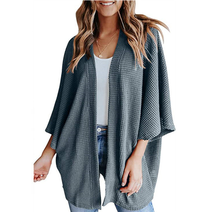 Ladies casual knit kimono with a loose fit and chic casual design