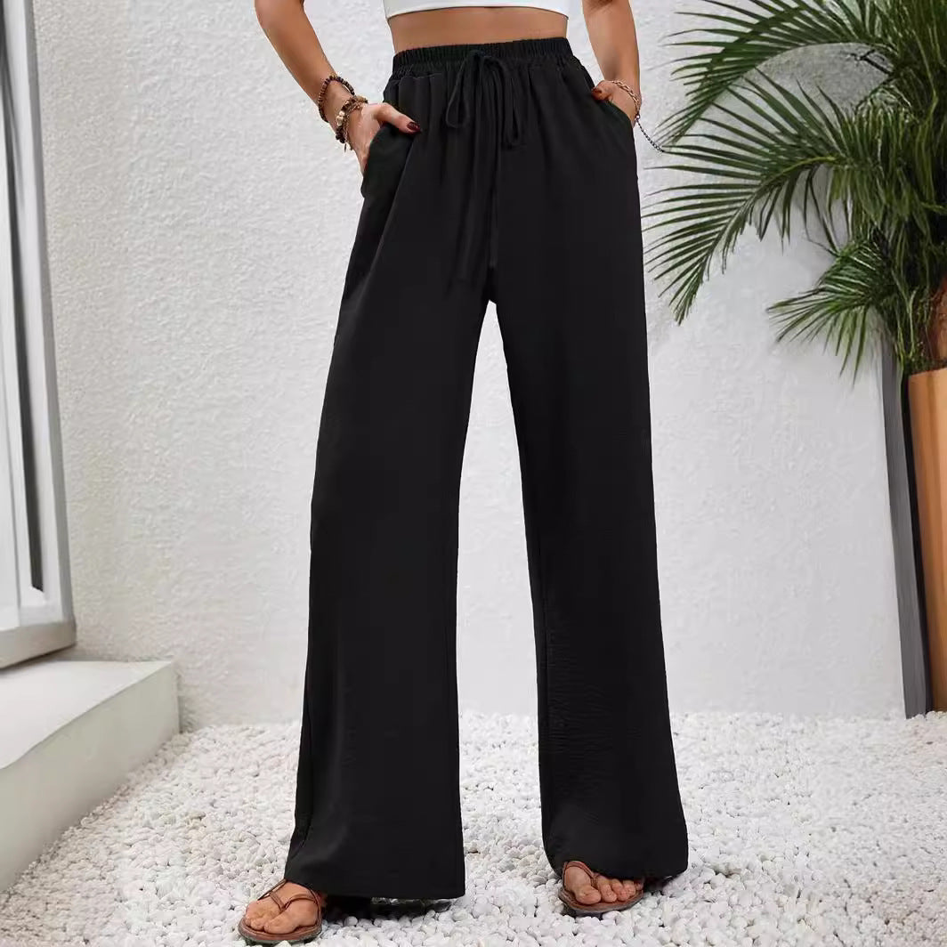 Loose-fit leisure pants for women with an elastic waistband and practical side pockets Lune London