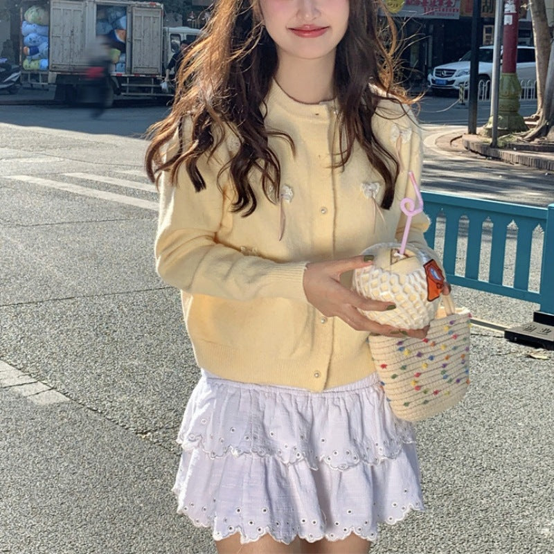 Cardigan Kawaii pour Femme avec Nœuds Décoratifs et Perles Chic & Stil