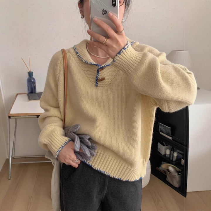 Casual knitted sweater for women with a unique button design and contrasting details Lune London