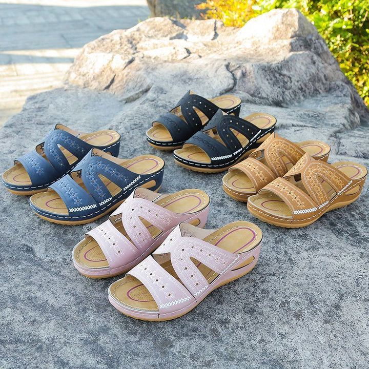 Comfortable strap sandals for women with floral design and adjacent openings Lune London