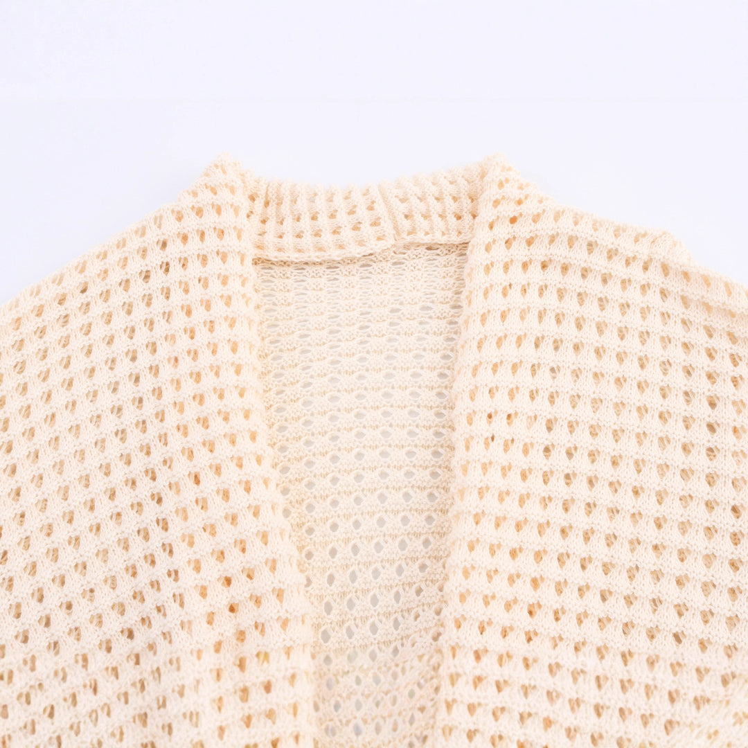 Women's knit cardigan with asymmetrical design and elegant belt at the waist Lune London