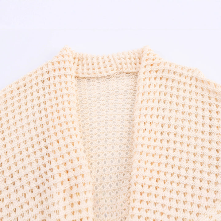 Women's knit cardigan with asymmetrical design and elegant belt at the waist Lune London