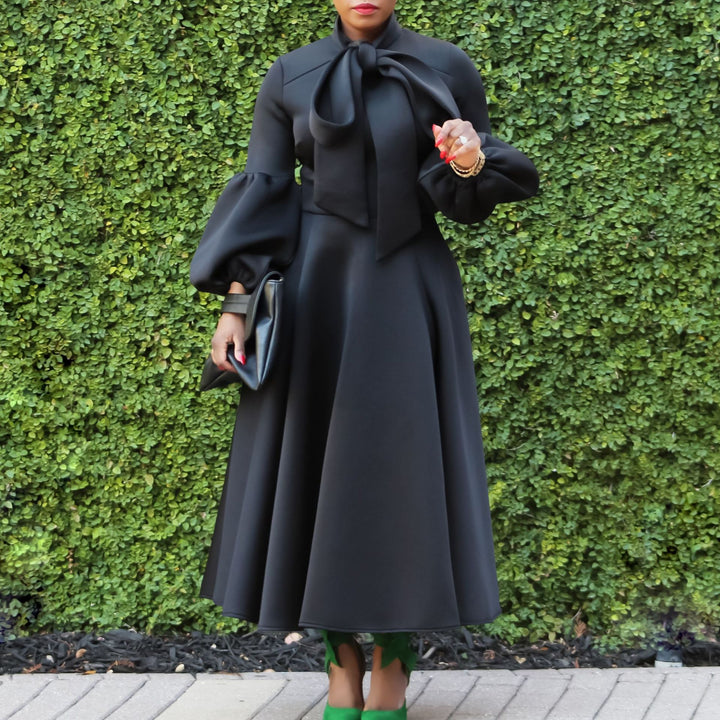 Midi dress for ladies with tie neck and voluminous sleeves Lune London