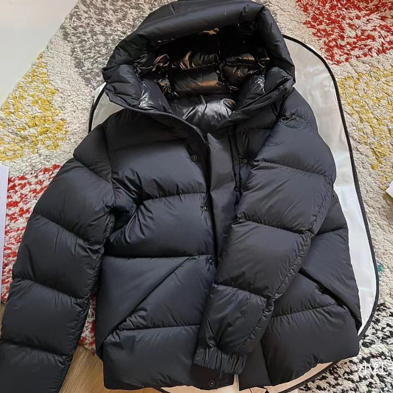 Ladies down jacket with high collar and practical zippered pockets Lune London