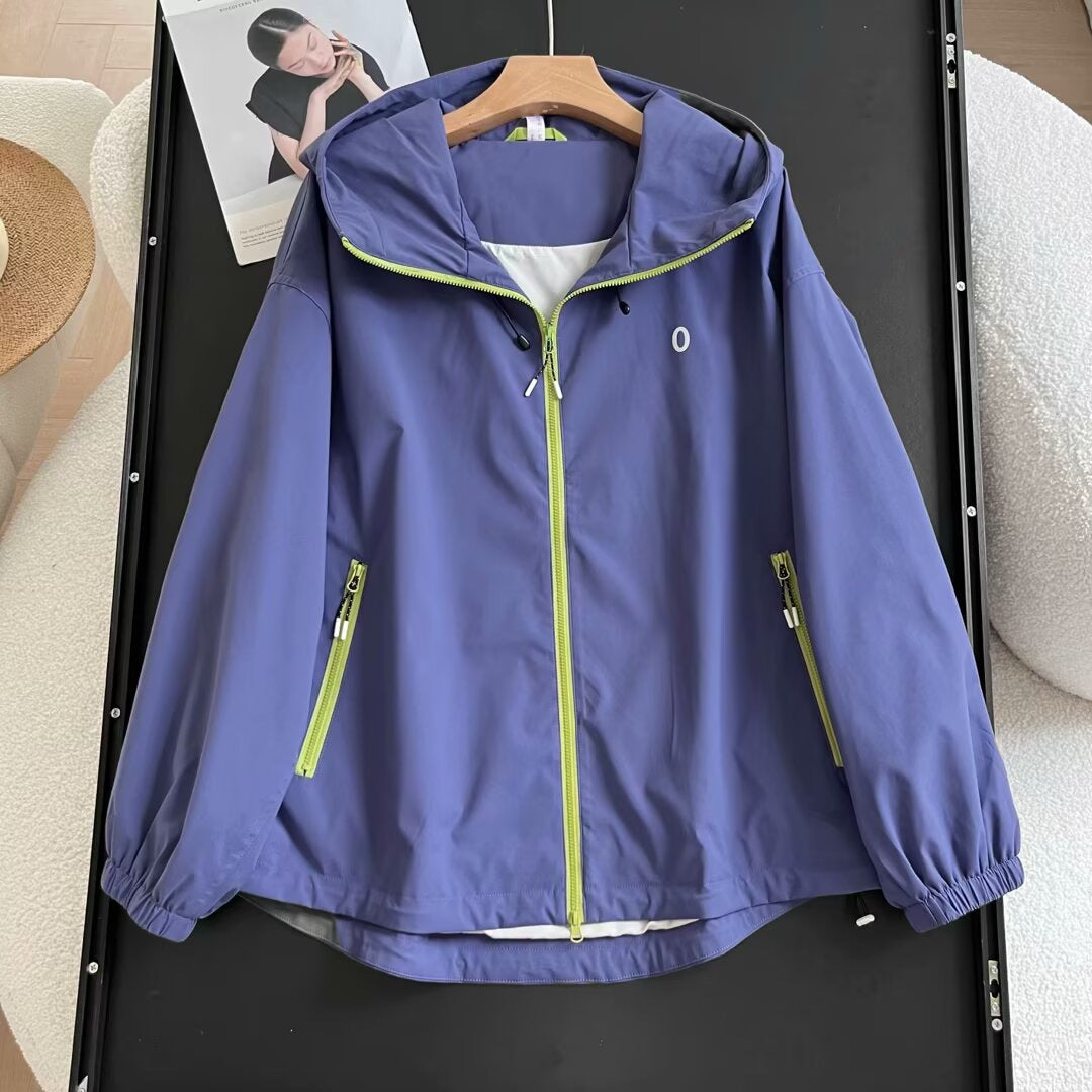 Veste coupe-vent légère pour femmes avec poches zippées sur les côtés Chic & Stil
