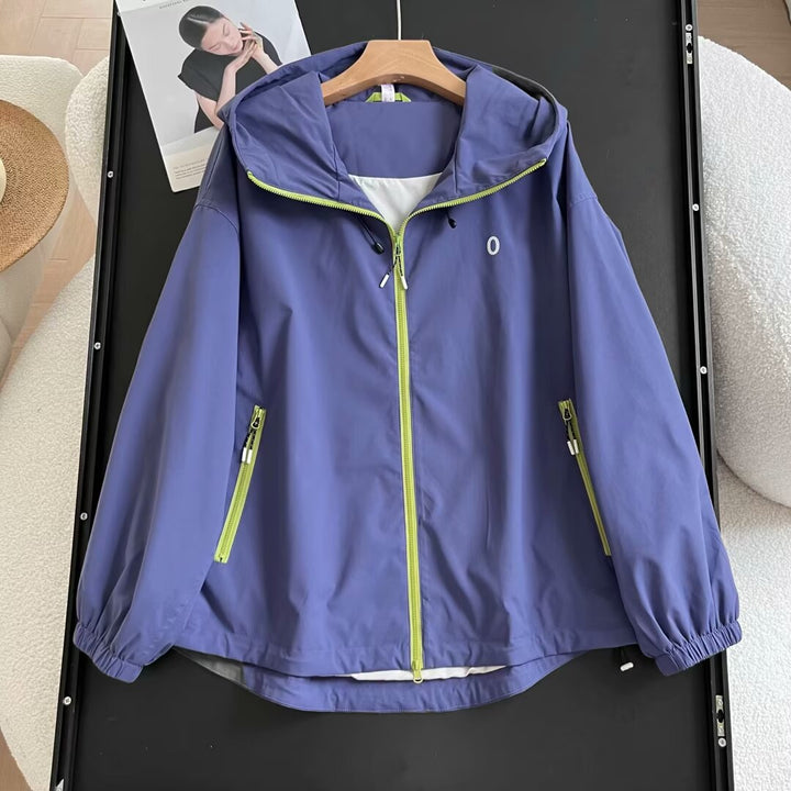 Veste coupe-vent légère pour femmes avec poches zippées sur les côtés Chic & Stil