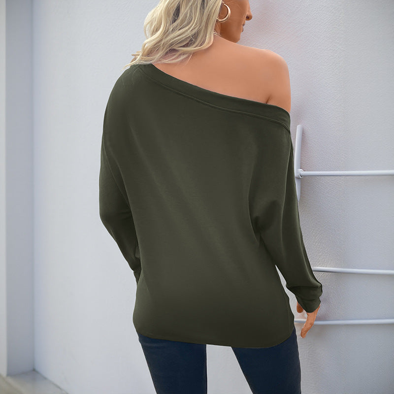 Chemise pour femmes à manches longues surdimensionnée avec encolure asymétrique et détails de boutons fins Chic & Stil