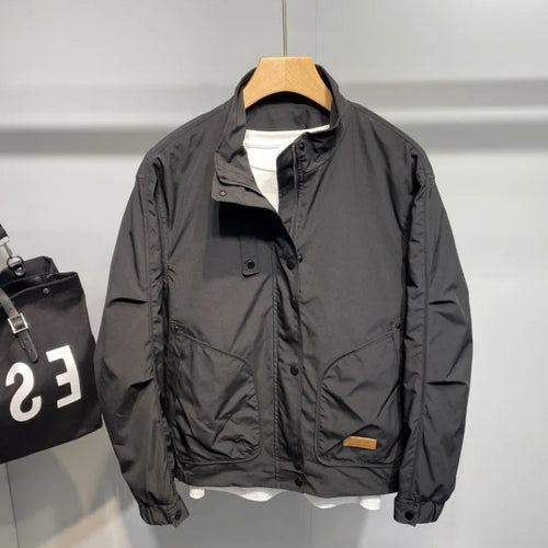 Durable transition jacket for men with practical pocket arrangement and adjustable collar Lune London