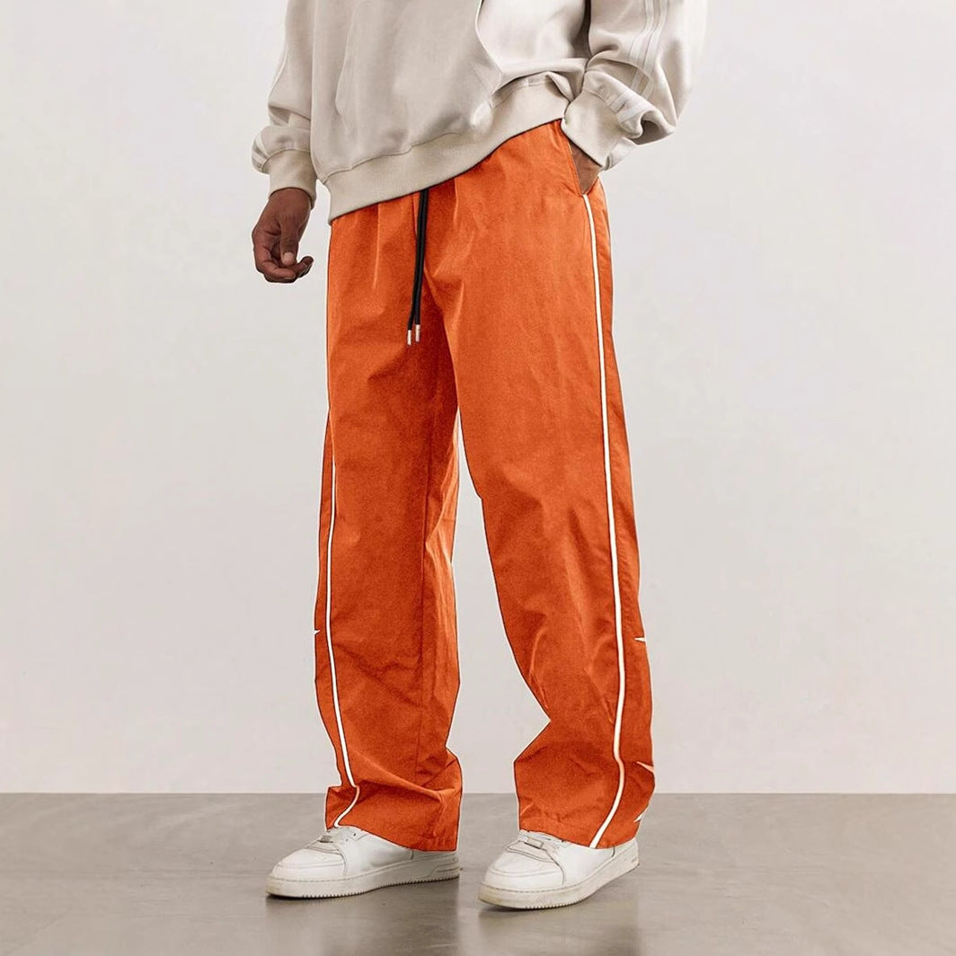 Sport leisure pants for men with chic and stylish side appliqués