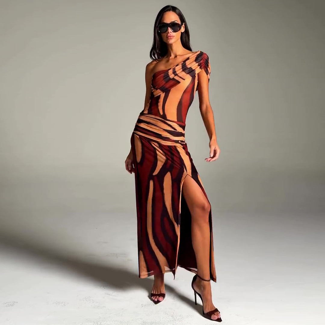 Women's maxi dress with asymmetric cut and exciting graphic design