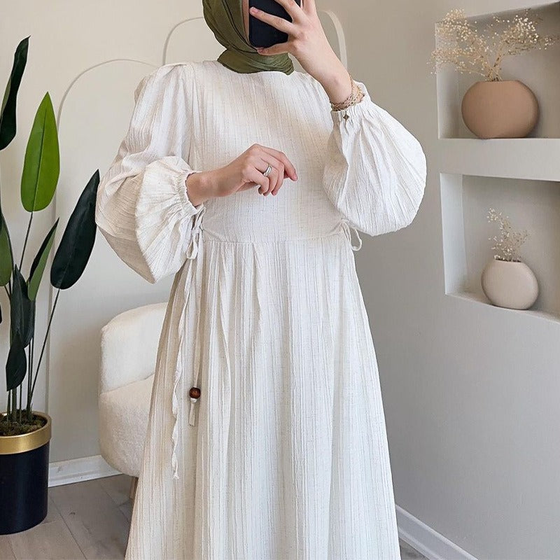 Maxi dress for women with an elegant pleated design and long puff sleeves Lune London