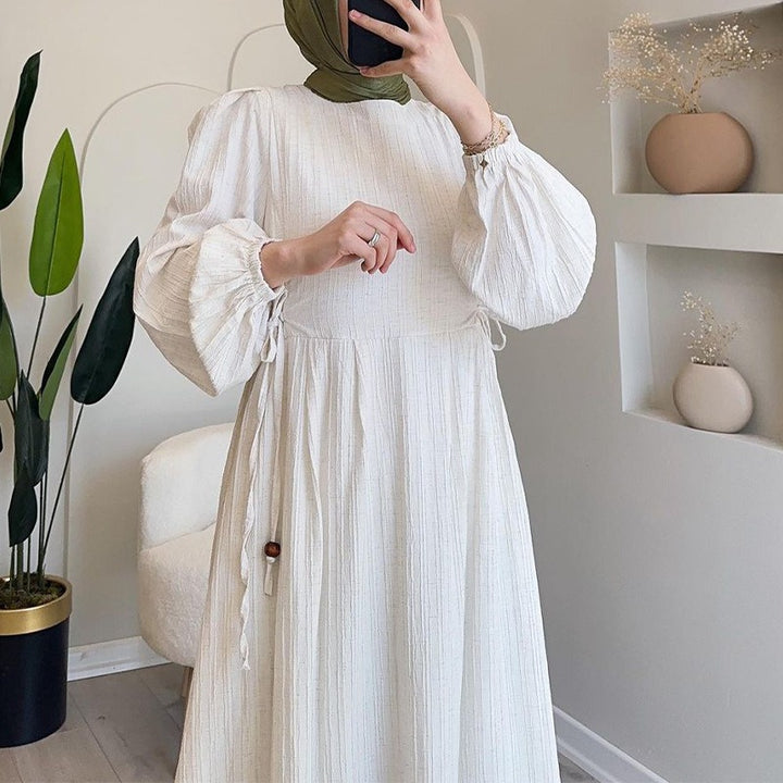 Maxi dress for women with an elegant pleated design and long puff sleeves Lune London