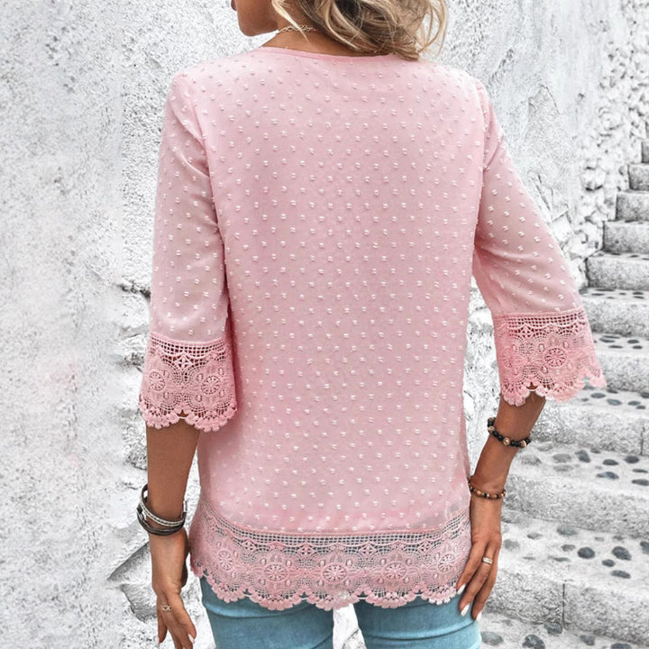 Blouse femme avec des détails en dentelle esthétique et des manches bouffantes Chic & Stil