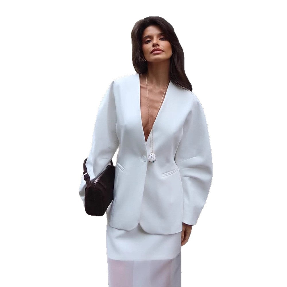 Elegant blazer jacket for women with dramatic puff sleeves Lune London