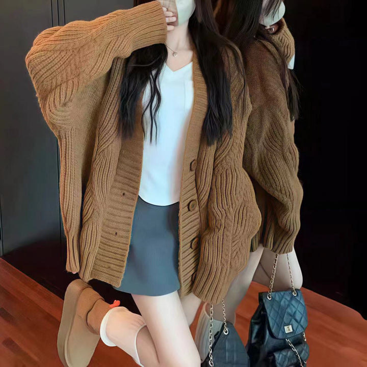 Ladies oversized knit cardigan with oversized sleeves and large button details Lune London