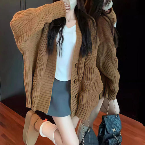 Ladies oversized knit cardigan with oversized sleeves and large button details Lune London