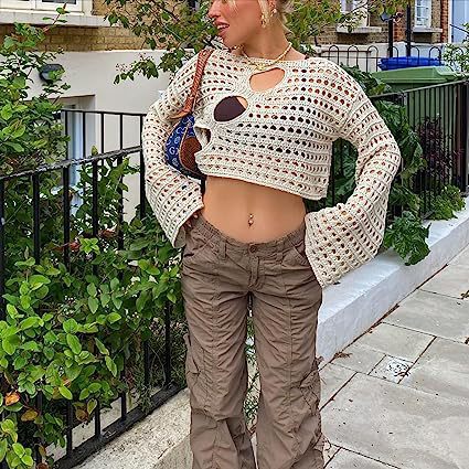 Ladies casual cropped knit sweater with a unique hole pattern Lune London