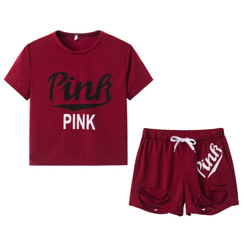 Ensemble t-shirt et short pour femmes sportif avec coupe décontractée et imprimés contrastés Chic & Stil