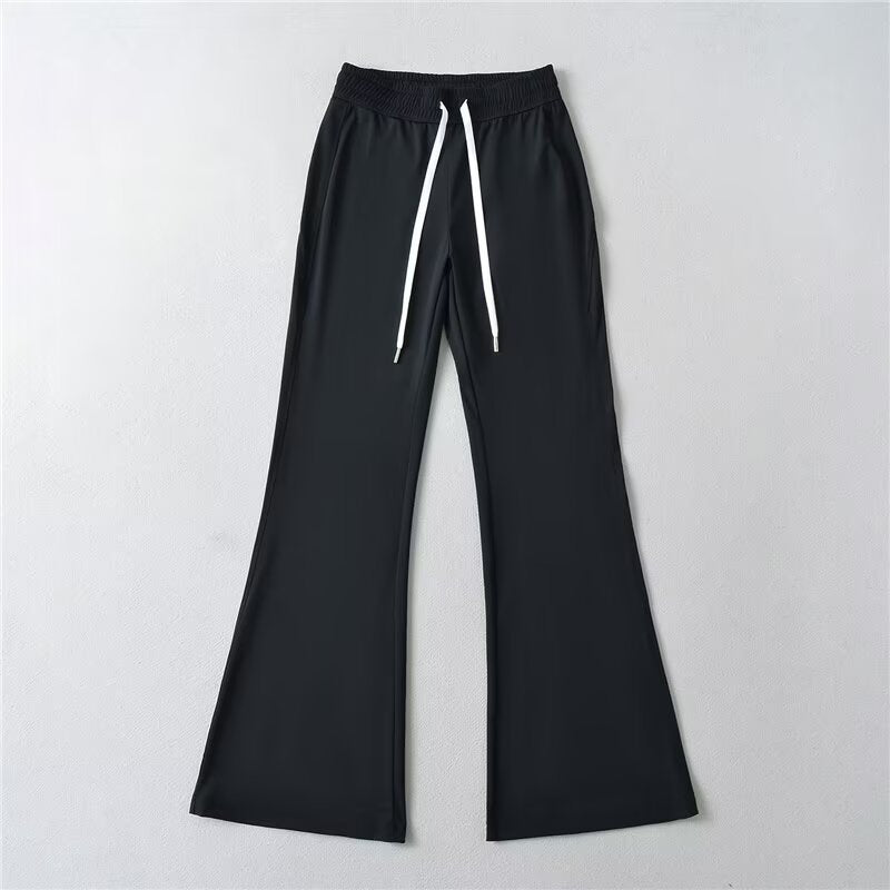Pantalons évasés sportifs pour femmes avec taille élastique et poches pratiques Chic & Stil