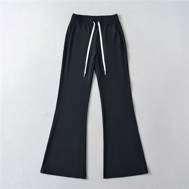 Pantalons évasés sportifs pour femmes avec taille élastique et poches pratiques Chic & Stil