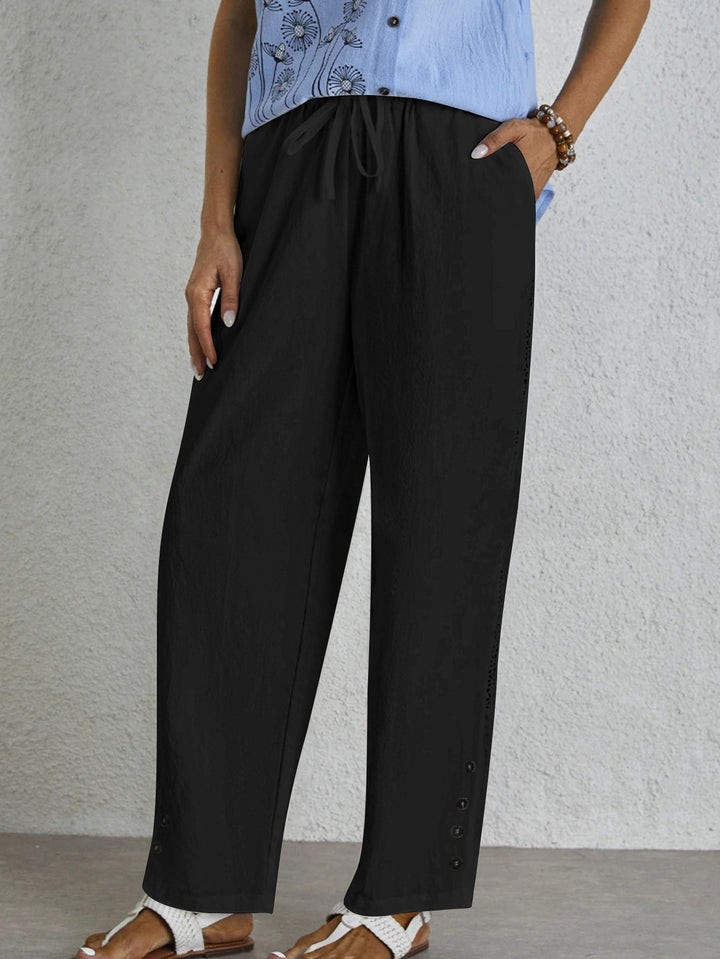 Oversized summer pants for women with elastic waistband and side button details Lune London