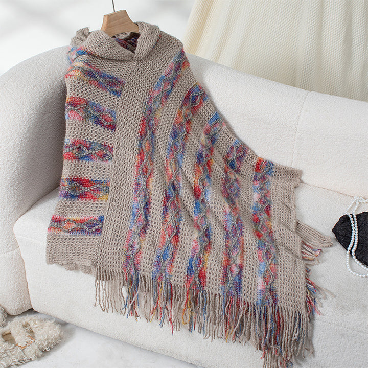 Ladies knitted poncho with hood and fringe design Lune London