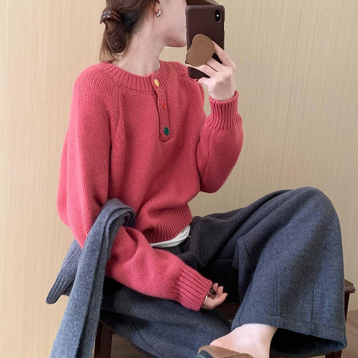 Pull confortable pour femmes avec des détails de boutons colorés et un matériau doux Chic & Stil