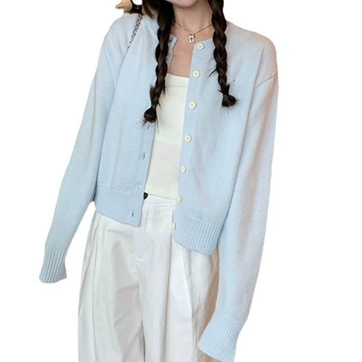 Cardigan doux femme avec boutons fins et coupe moderne Chic & Stil