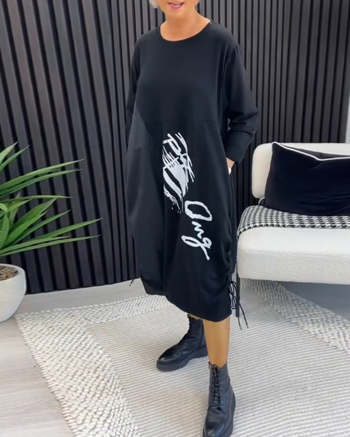 Robe hoodie oversize pour femmes avec poches latérales et imprimé graphique Chic & Stil