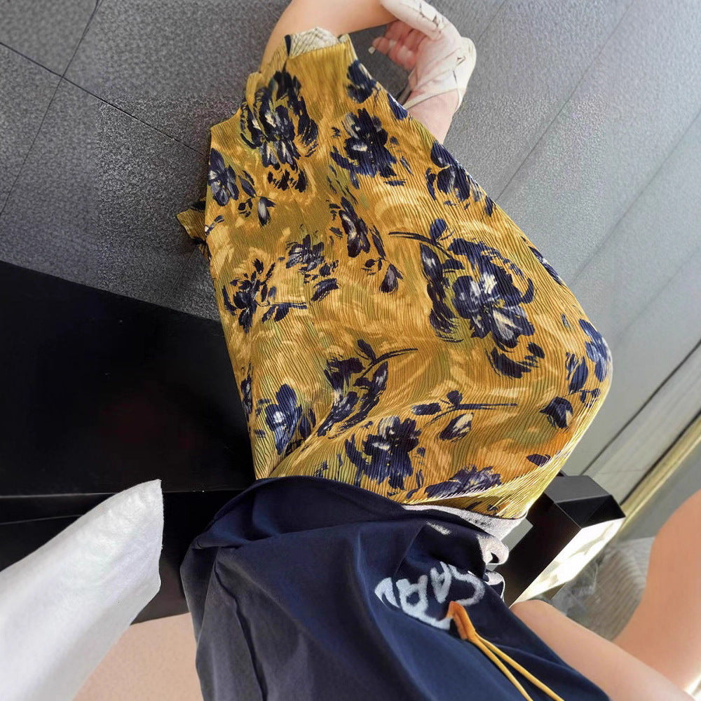 Maxi skirt for women with elegant pleats and floral appliqués Lune London